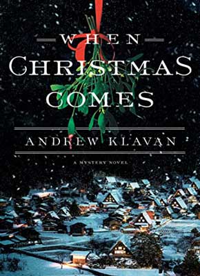 When Christmas Comes by Andrew Klavan book cover with houses at night with snow on roof