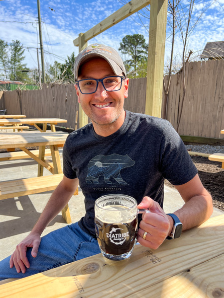 Tom with beer at Diatribe Brewing Co.