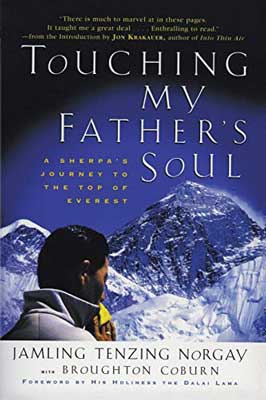 Touching My Father’s Soul: A Sherpa's Journey to the Top of Everest by Jamling Tenzing Norgay book cover with person in jacket on snowy mountain