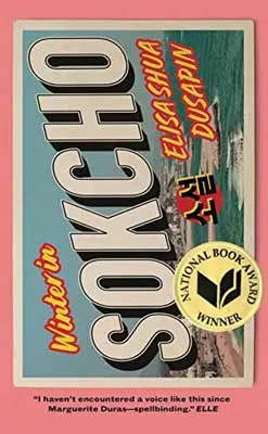 Winter in Sokcho by Elisa Shua Dusapin book cover with National Book Award Winner sticker and title sideways with landscape in background