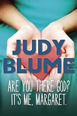 Are You There God? It’s Me, Margaret by Judy Blume book cover with white hands holding a red heart