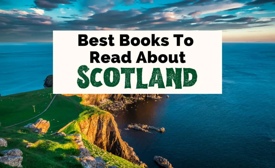Books About Scotland with image of green and brown cliffs with lighthouse jutting into bright blue sea with clouds in the sky