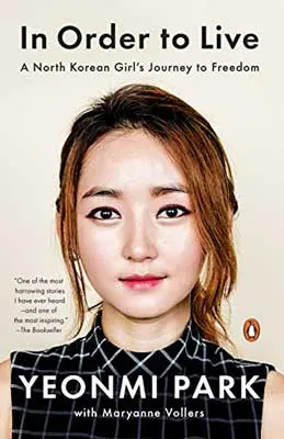 In Order to Live by Yeonmi Park and Maryanne Vollers book cover with portrait of North Korean woman's face