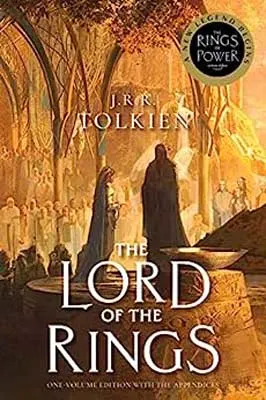 The Lord of the Rings by JRR Tolkien book cover with two people standing on raised platform and others gathered around