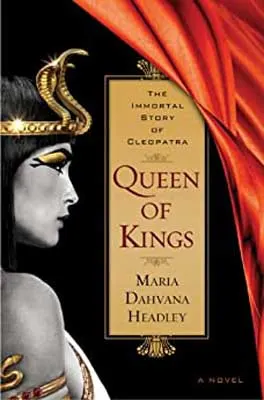 Queen of Kings by Maria Dahvana Headley book cover with image of person in golden snake crown