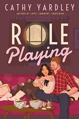 Role Playing by Cathy Yardley book cover with illustrated red haired person in plaid and brunette person in cozy clothes cuddling on a couch