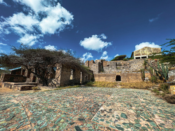 Spanish Lagoon Balashi Gold Mills in Aruba which are brick ruins of a mill with blue clouded sky