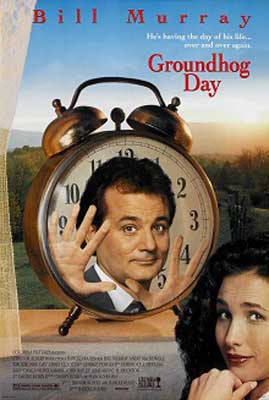 Groundhog Day Movie Poster with white brunette male trapped in old fashioned alarm clock