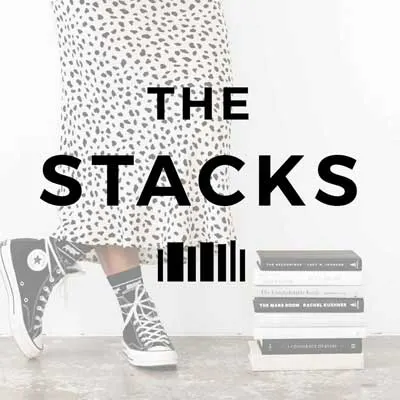 The Stacks Podcast cover with someone standing from bottom half down wearing black sneakers next to stack of black and white covered books