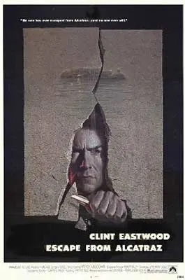 Escape from Alcatraz Movie Poster with black and white image of person with hammer breaking through concrete wall