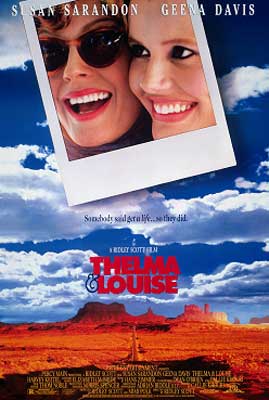Thelma And Louise Movie Poster with photograph of two white women and blue cloudy sky with dry mountain landscape