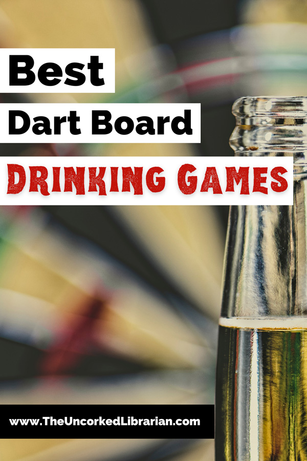 Best Darts Drinking Games Pinterest Pin with URL of The Uncorked Librarian website with image of beer bottle filled yellow liquid in front of a blurred black, green, red, and off white dart board