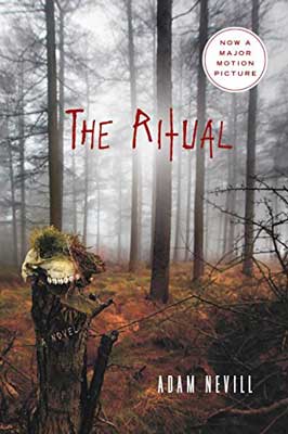 The Ritual by Adam Nevill book cover with foggy woods, brown grass, and tree stump with something odd or creepy on it