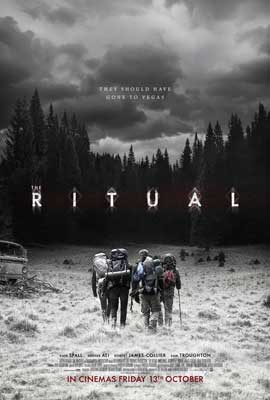 The Ritual Movie Poster with four people hiking in snow toward dark forest
