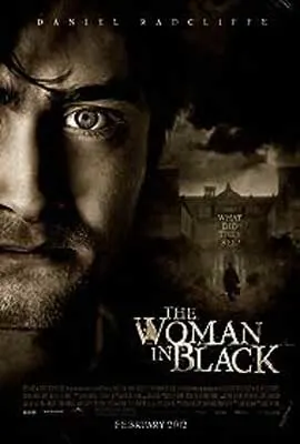 The Woman in Black Movie Poster with image of half of a man's face and house in background