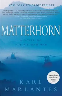 Matterhorn: A Novel of the Vietnam War by Karl Marlantes book cover with  foggy blue mountain scene and sky with helicopters flying in the air