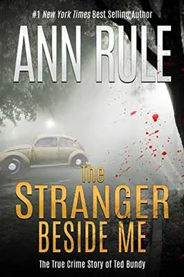 The Stranger Beside Me by Ann Rule book cover with image of car on road in fog and blood splatters