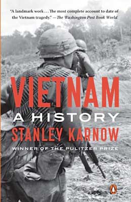 Vietnam: A History by Stanley Karnow book cover with black and white image of soldiers and red and white title