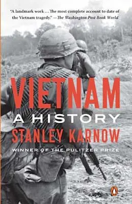 Vietnam: A History by Stanley Karnow book cover with black and white image of soldiers and red and white title