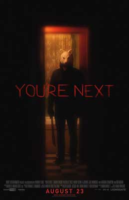 You're Next Movie Poster with image of person in black standing in doorway with a rabbit head mask on
