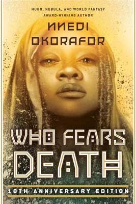 Who Fears Death by Nnedi Okorafor book cover with image of person's face with golden hued tint over it