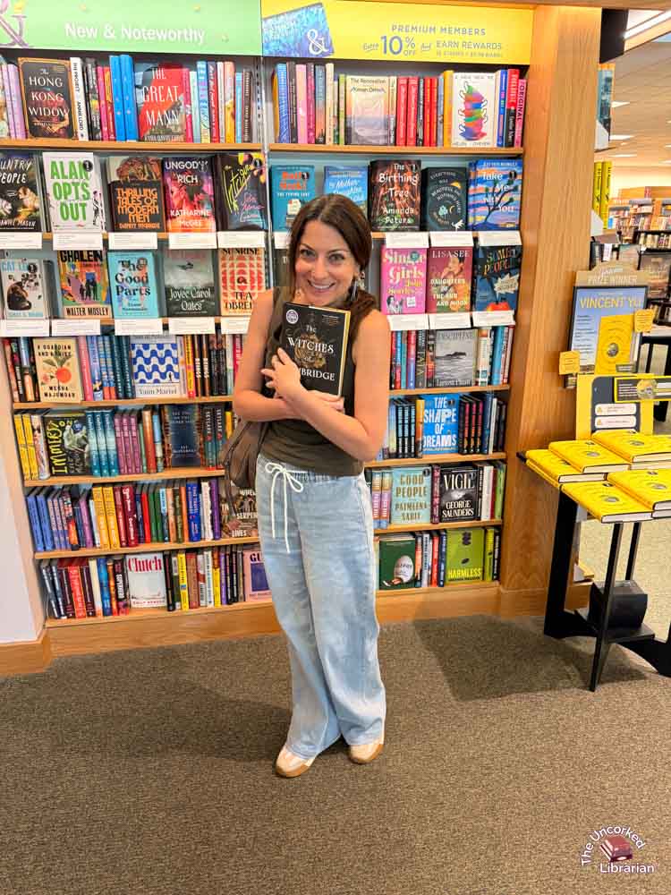 Christine buying The Witches of Cambridge by Alice Hoffman